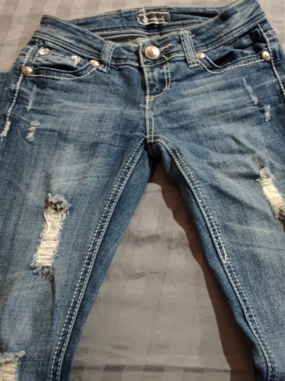 Soundgirl Distressed Skinny Jeans in Faded Blue